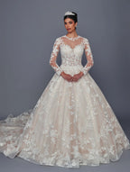 Vestido de novia DeKlaire Bridal corte línea A con encaje, manga larga y escote ilusión.