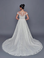 Vista trasera de vestido de novia DeKlaire Bridal corte línea A con encaje y escote ilusión.